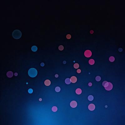 The primary subject of the image is a blue background with a pattern of pink and blue circles. The setting is a dark room, and the visual style appears to be a digital art or illustration. The dominant colors are blue, pink, and blue, creating a calm and soothing atmosphere.